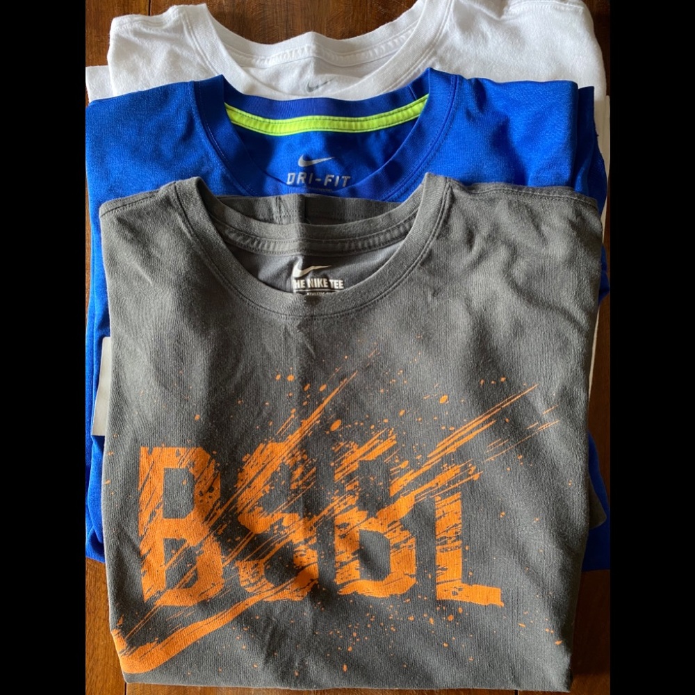 3 Nike T-Shirts.